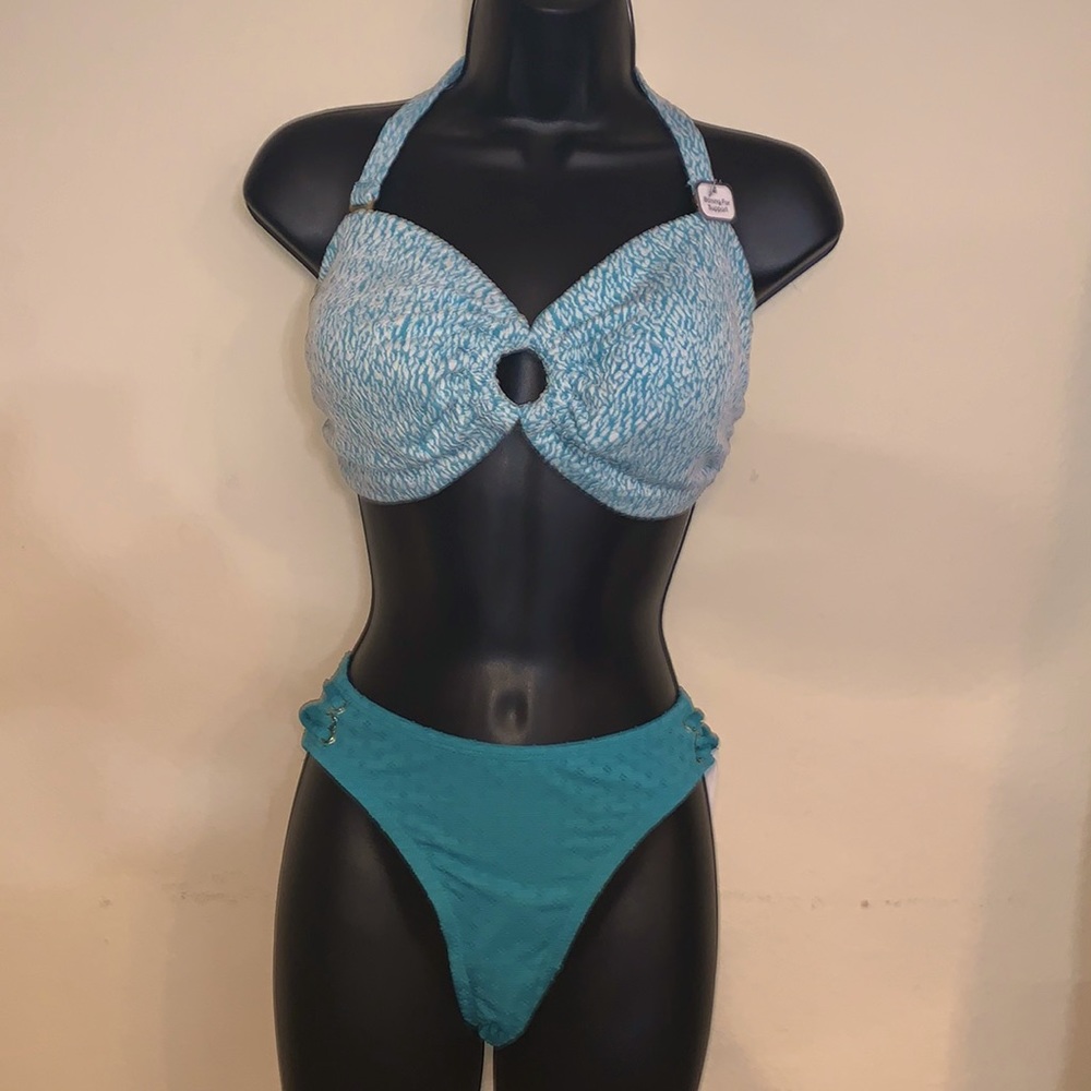 Brand NWT bikini top and bottom. Pretty Aqua color. 2 Piece Bathing Suit. NWT
